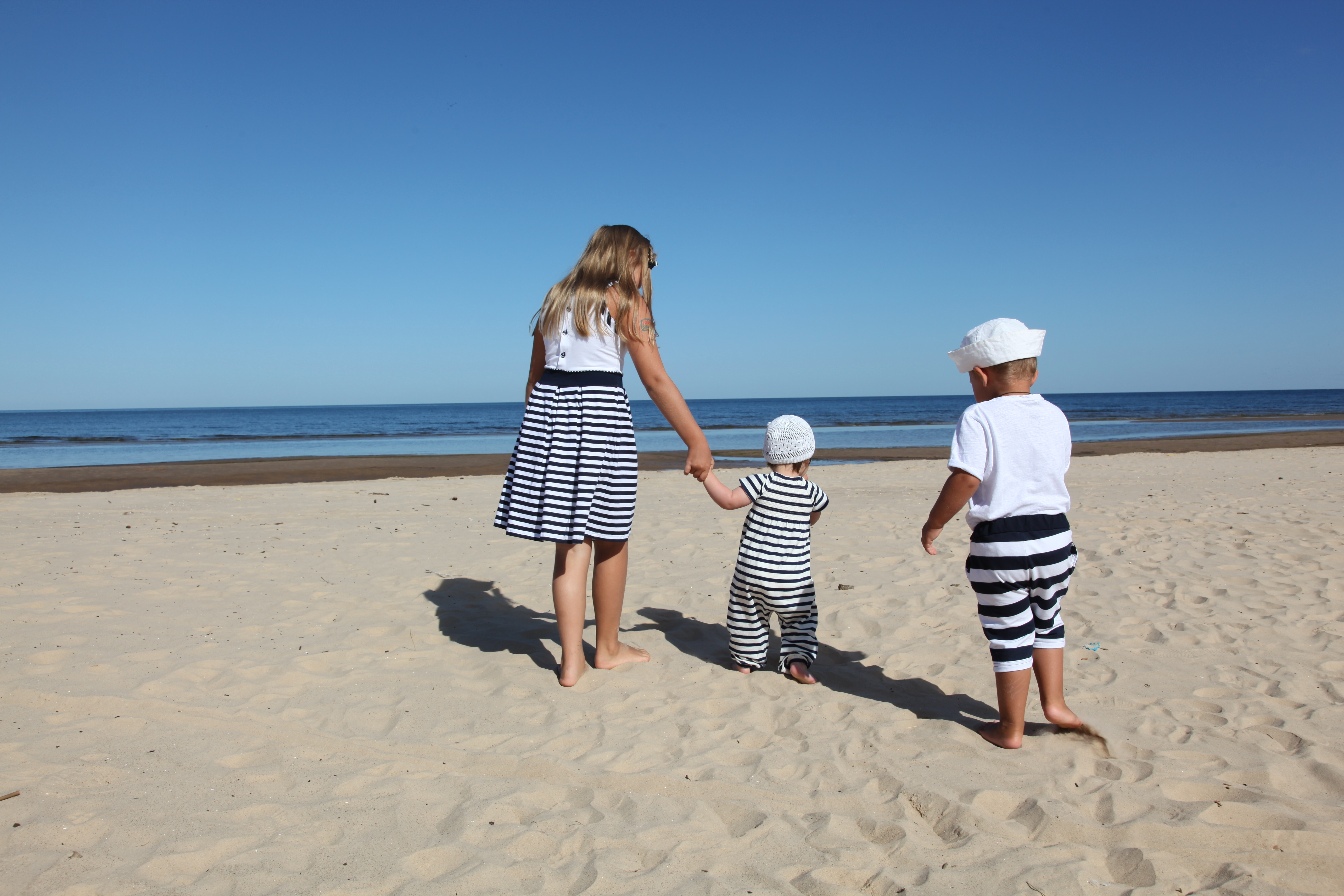 photo of family on beach